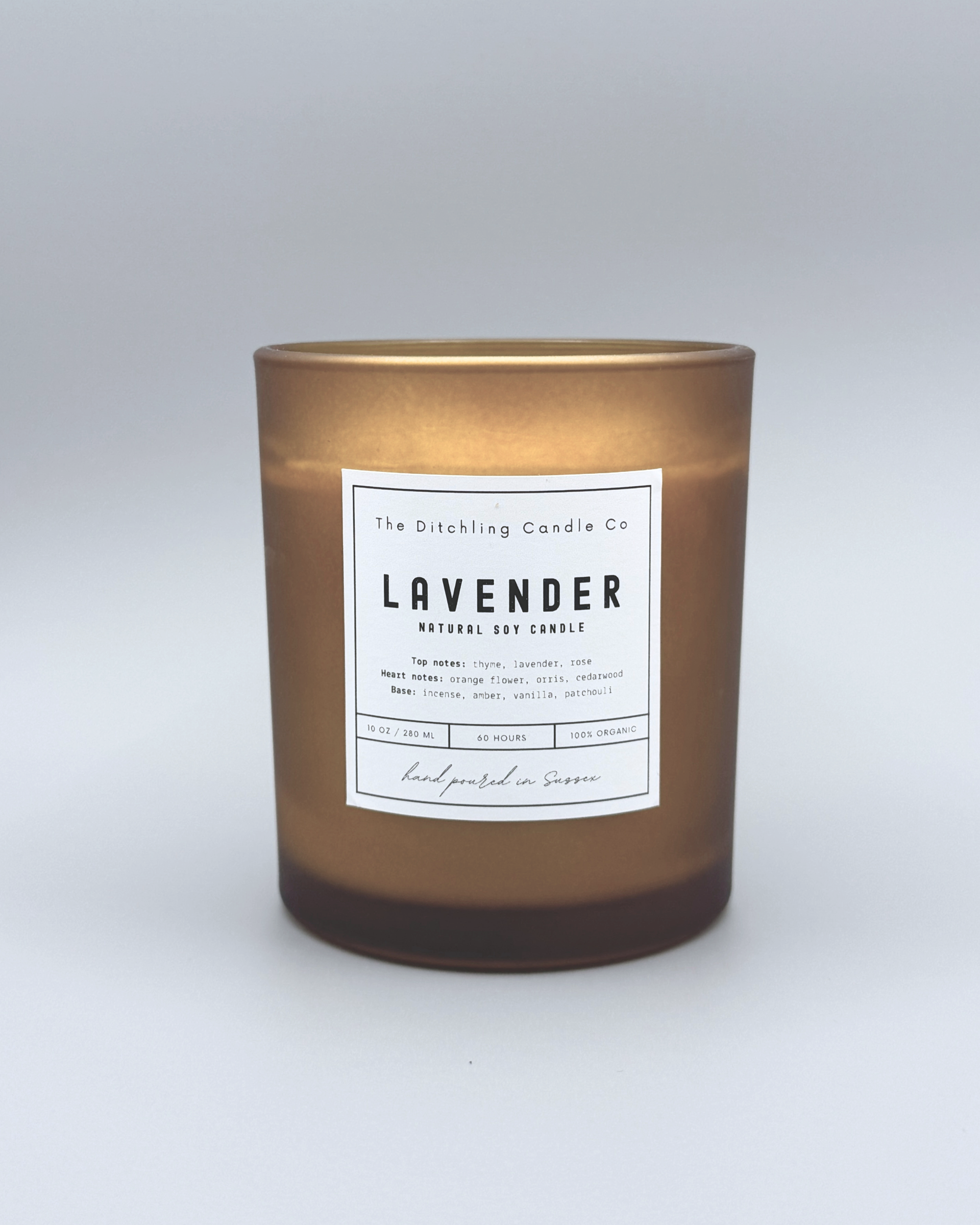 Natural soy, lavender scented candle in a 10oz amber glass, with white label and matt grey background. Top notes of thyme, lavender and rose. Heart notes of orange, flower, orris and cedarwood. Base notes of incense, amber, vanilla and patchouli. Finished with a wooden wick.